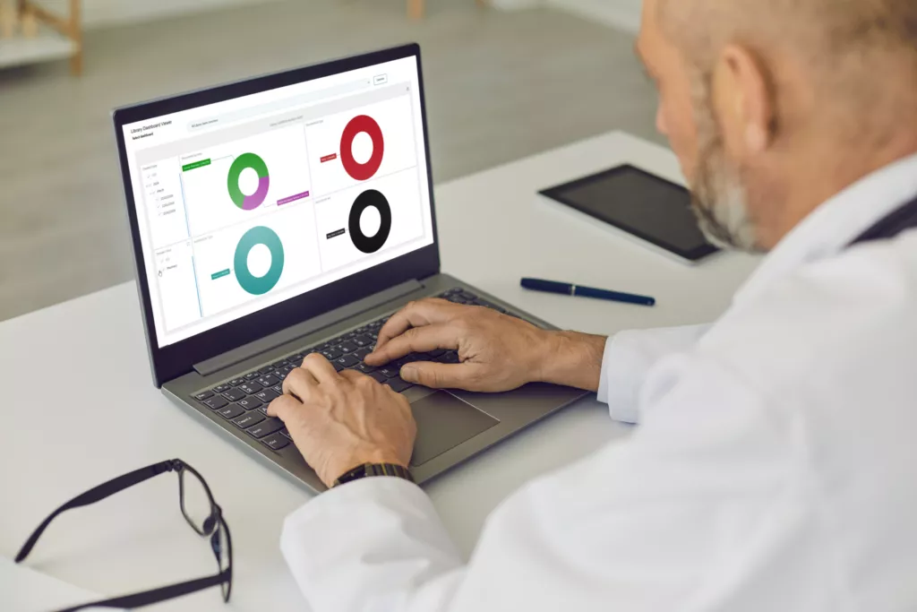 Medical professional looking at donut chart